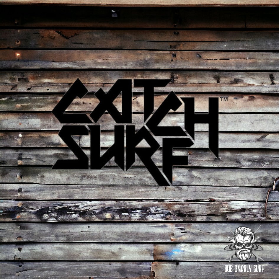 Catch Surf logo in bold black letters on weathered wood background with Bob Gnarly Surf skull emblem