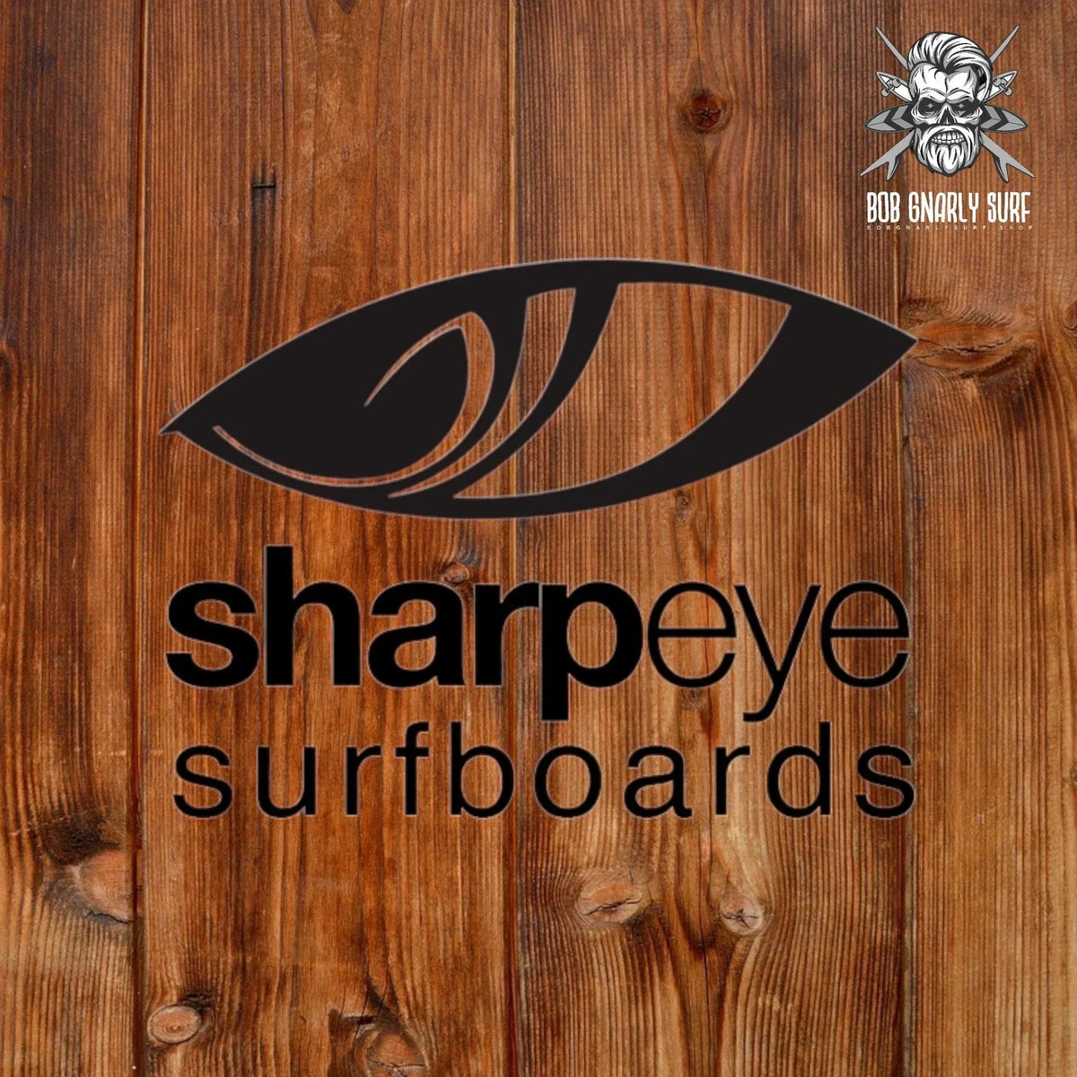 Sharpeye Surfboards logo with stylized eye graphic on wooden background and Bob Gnarly Surf emblem